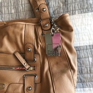 Tyler Rodan camel tan colored multi pocket purse